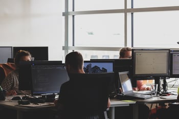 Man working at computer monitor