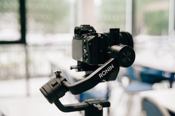 Video camera on a tripod